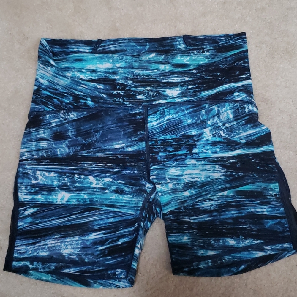 Train Times spandex shorts